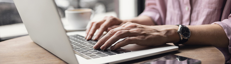 Young relaxed woman working in a city. People, technology, business, city life, social distancing, distance learning, communication, staying connected, modern lifestyle, studying online concept