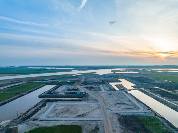 Reeve construction site neaar Kampen seen from above Newly established village Reeve construction site neaar Kampen seen from above. There is a shortage of houses in The Netherlands empty lot construction stock pictures, royalty-free photos & images
