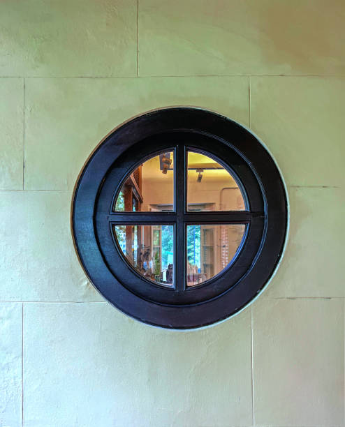 istock Rare round wood window 1388349903