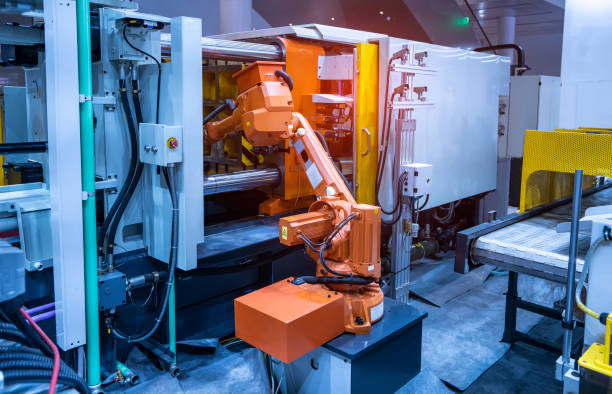 istock Automatic industrial robotic robot working, industry 4.0 and technology concept 1388350176