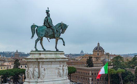 A picture of the Equestrian Statue of Victor Emmanuel II overlooking the city of Rome from the Altar of the Fatherland.