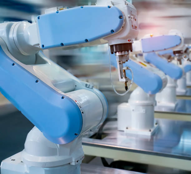 istock Automatic industrial robotic robot working, industry 4.0 and technology concept 1388350938