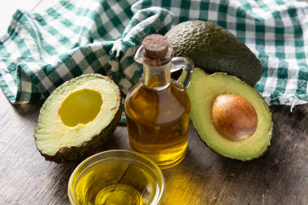 istock Oil and ripe fresh avocado 1388353094