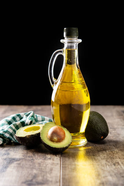 istock Oil and ripe fresh avocado 1388353111