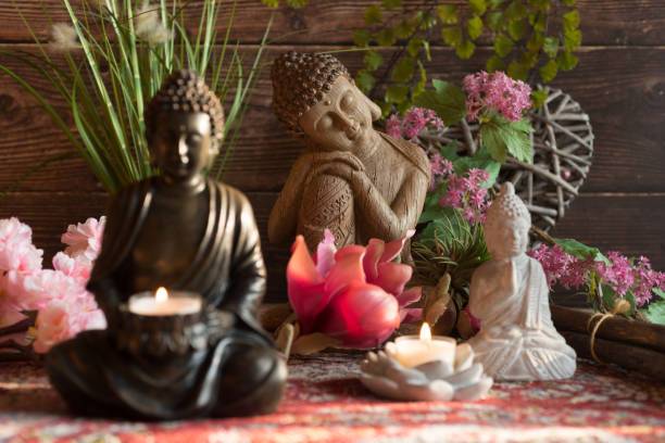 istock Buddha in the ambience with candlelight and atmospheric lighting 1388355568