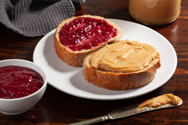 istock smooth peanut butter and jam bread toast, american traditional sandwich 1388357262