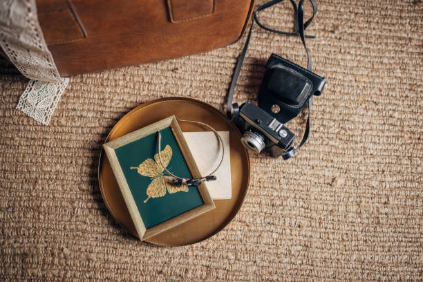 Female personal accessories on picture frame.