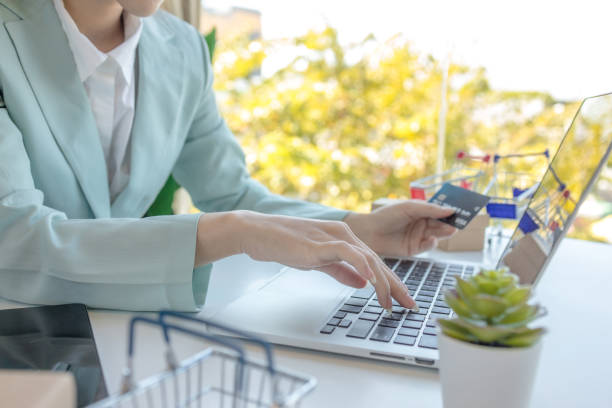 istock Woman doing online transactions 1388359802