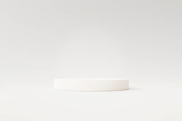 istock Modern White podium pedestal product display stand background 3d rendering 1388362949