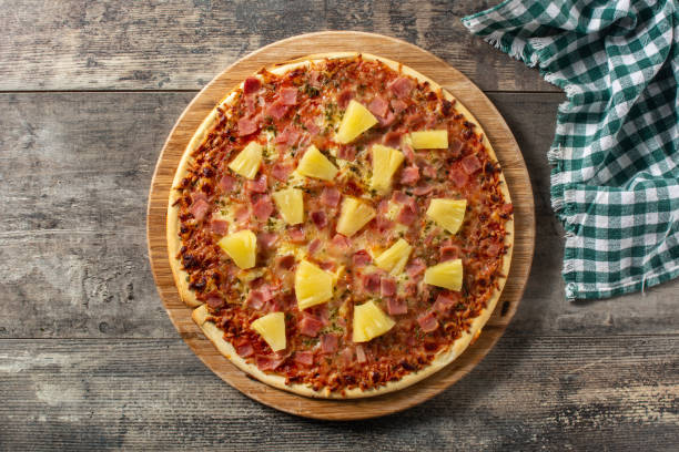 istock Hawaiian pizza with pineapple,ham and cheese 1388363297