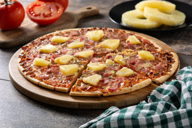 istock Hawaiian pizza with pineapple,ham and cheese 1388363365