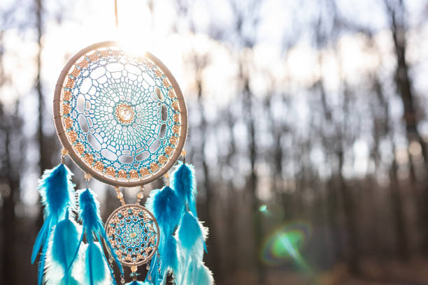 Dream catcher with feathers threads and beads rope hanging. Dreamcatcher handmade