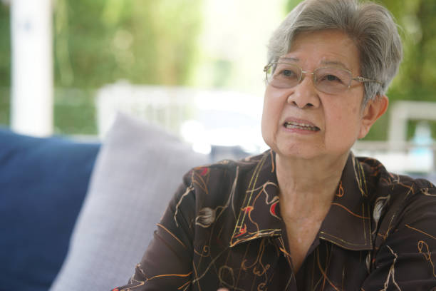 istock old woman resting relaxing in garden 1388364503