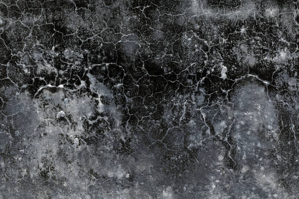 istock Distressed grunge texture with random cracks on an old abandoned concrete wall surface 1388365642