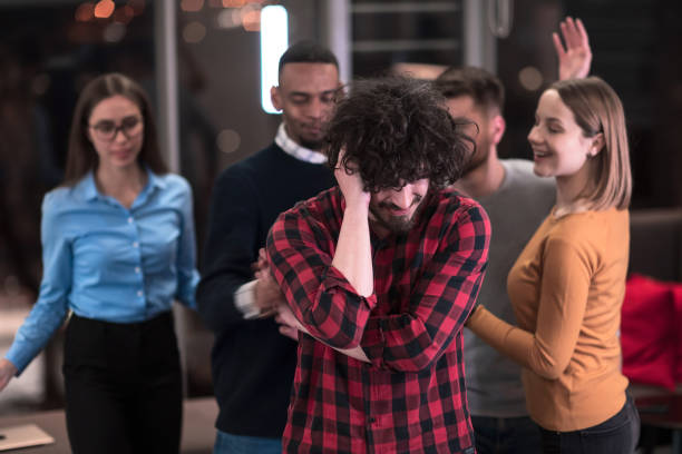 istock A group of young business people have fun playing interesting games while taking a break from work in a modern office. Selective focus 1388365664