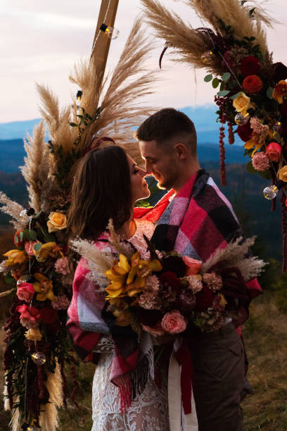 istock Young couple on the night wedding ceremony in mountains 1388367620