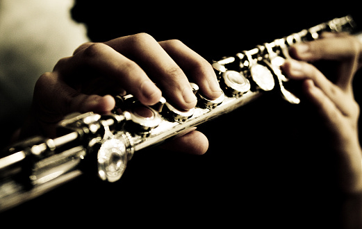 Young man play saxophone