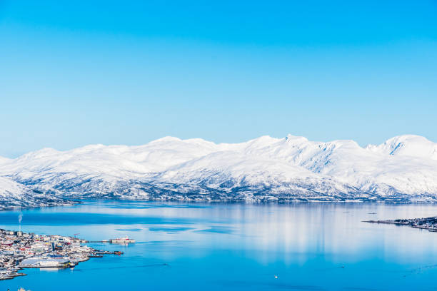 view from mount storsteinen on the norwegian mountains around the city of tromso, copy space - tromso fjord winter mountain imagens e fotografias de stock