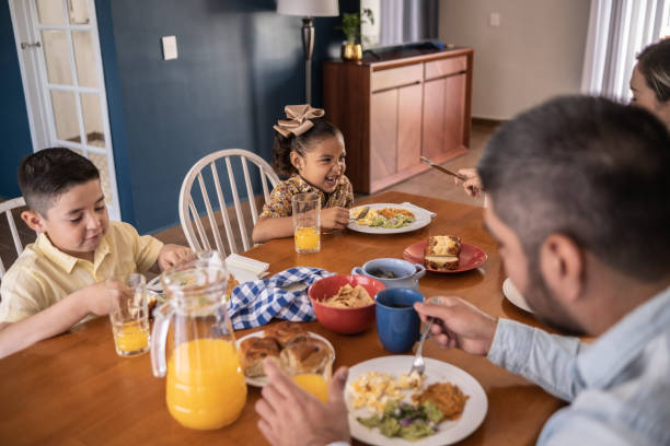 istock Latin family having breakfast at home 1388372172