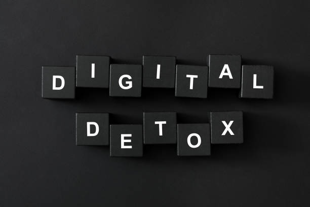 istock Cubes with phrase DIGITAL DETOX on black background, flat lay 1388373333