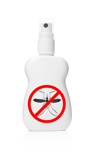 Bottle of insect repellent on white background