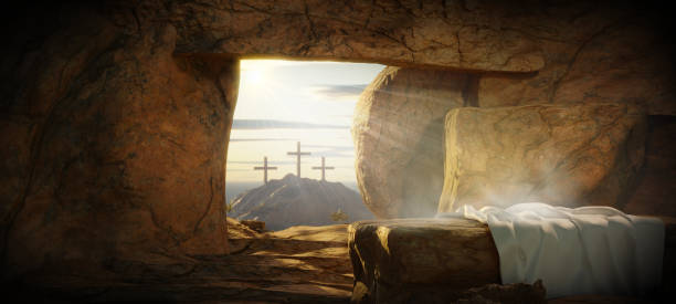 crucifixion and resurrection. he is risen. empty tomb of jesus with crosses in the background and cinematic lighting. easter or resurrection - pasen stockfoto's en -beelden