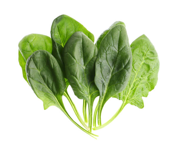 istock Fresh green healthy spinach leaves isolated on white, top view 1388374286
