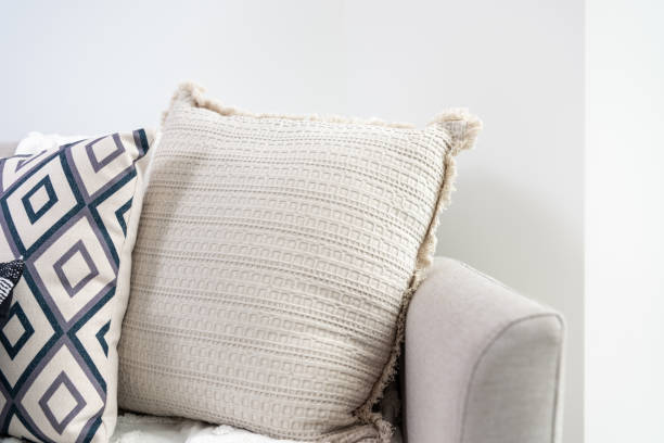 istock Close-up of throw pillows on sofa 1388377181