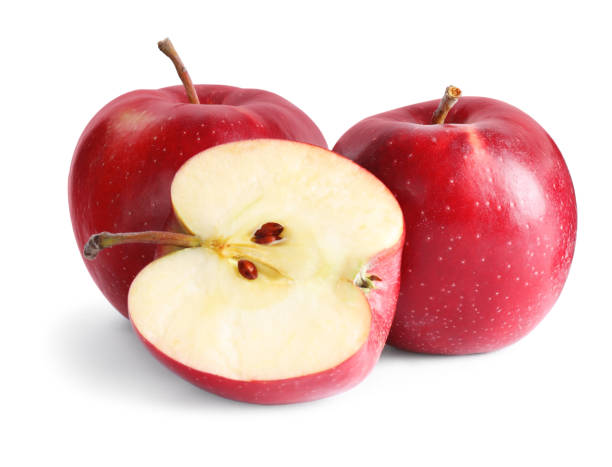 istock Fresh cut and whole apples isolated on white 1388377206