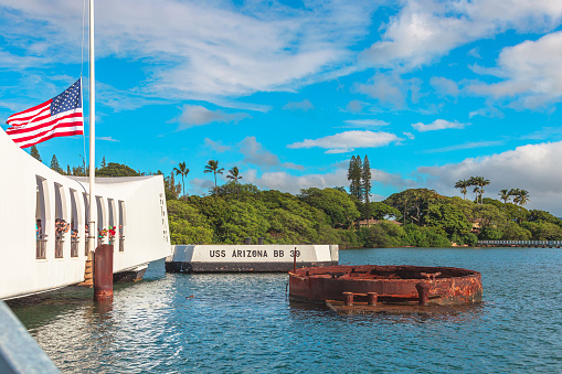 HONOLULU, OAHU, HAWAII, USA - AUGUST 21, 2016: Tourists visiting patriotic memorial monument shipwreck of USS Arizona BB 39 at Pearl Harbor. Sunken on December 7, 1941. National historic landmark.