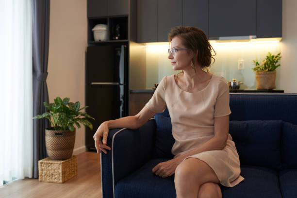 istock Contemplating Middle-Aged Woman 1388380268