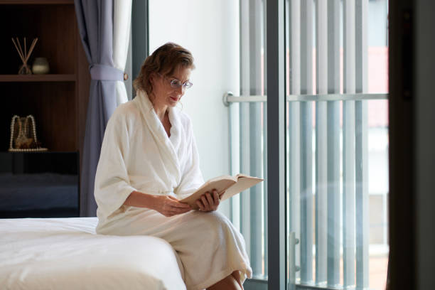 istock Woman Enjoying Reading Good Book 1388380320