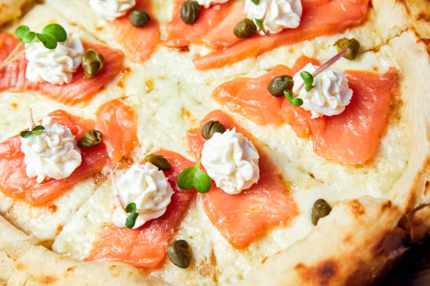 istock Pizza with salmon and cream cheese. Close-up, selective focus 1388388034