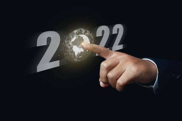 istock Businessman hand finger pointing virtual Global Internet connection 2022 and metaverse. 1388388781