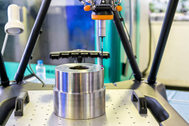 istock Close up automatic coordinate measurement machine (CMM) instrument for inspection high precision and high accuracy part during working 1388391728