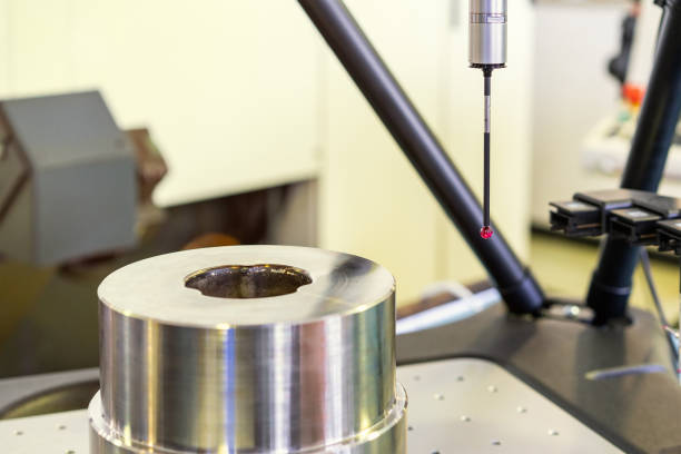 istock Close up head probe of automatic coordinate measurement machine (CMM) instrument for inspection high precision and high accuracy part during working 1388392083