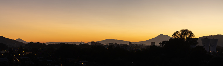 Dawn in Temuco with Llaima, Sierra Nevada and Lonquimay volcanoes as background in La Araucania region, southern Chile