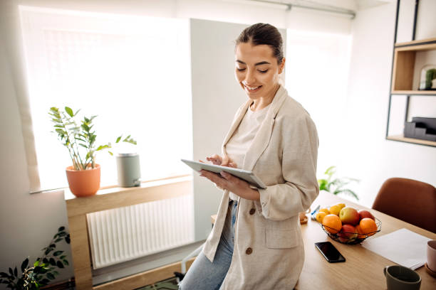 istock Woman with a digital tablet 1388395516