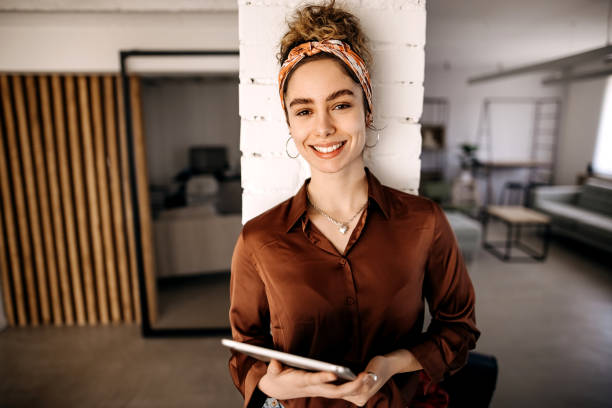 istock Woman with a digital tablet 1388396162