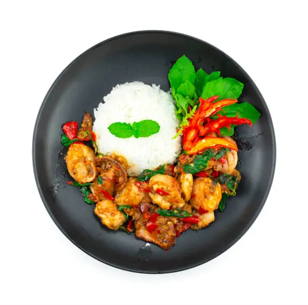 Stir Fried Squids with Basil Spicy Thaifood served Rice recipe decoration carving Chili and vegetables topview