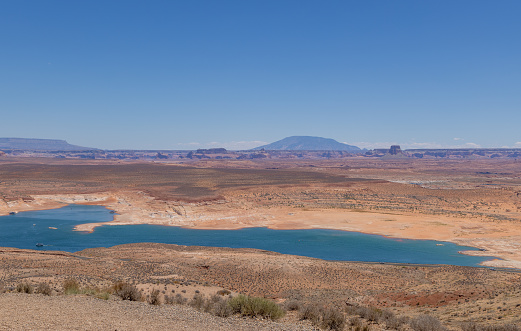 a scenic landscape of Lake Powell on the Arizona Utah border during a severe drought in summer