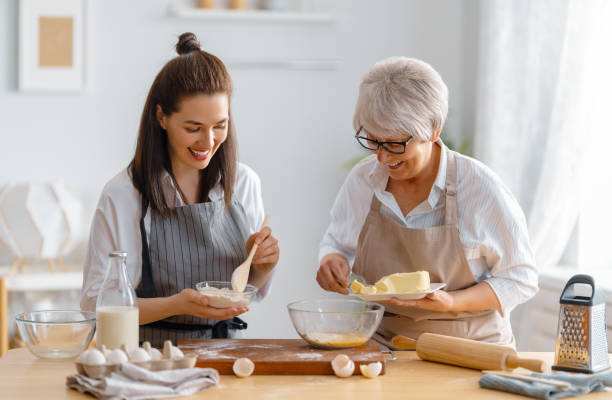 istock family are preparing bakery together 1388398219