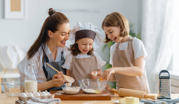 istock family are preparing bakery together 1388398230