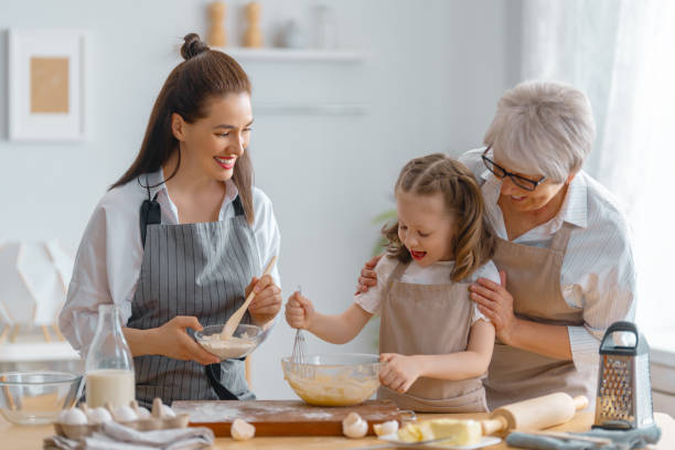 istock family are preparing bakery together 1388398250