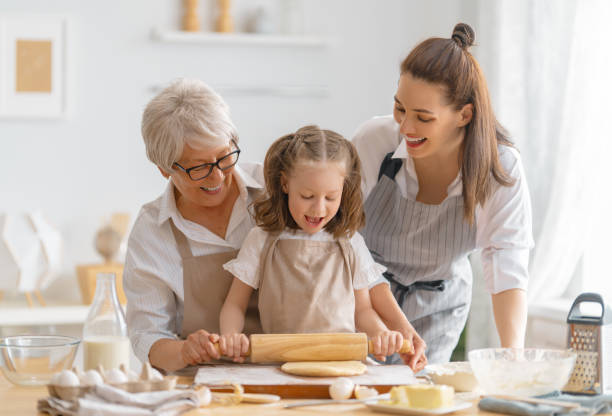 istock family are preparing bakery together 1388398306