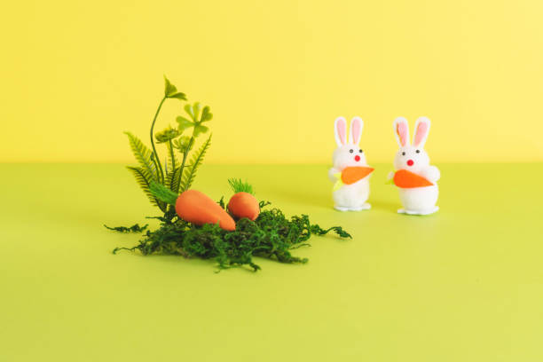 istock Easter composition with decorative rabbits, carrots and natural materials 1388398552