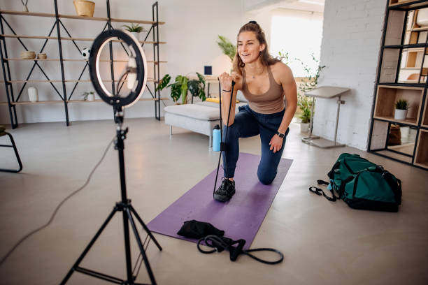 Woman vlogger exercising at home