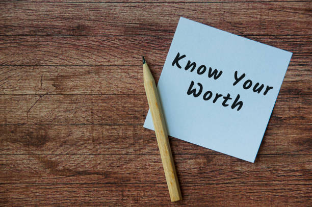 istock Life inspirational and motivation quotes - Know your worth text on white notepad. 1388401853