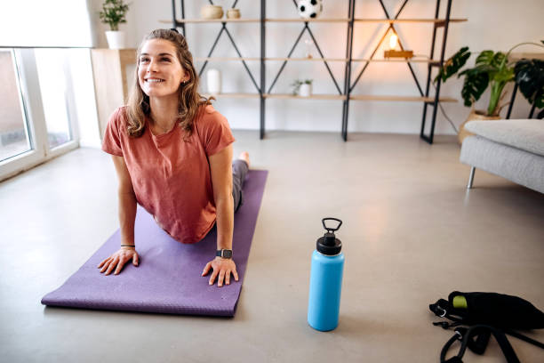 istock Beautiful woman doing yoga 1388401933