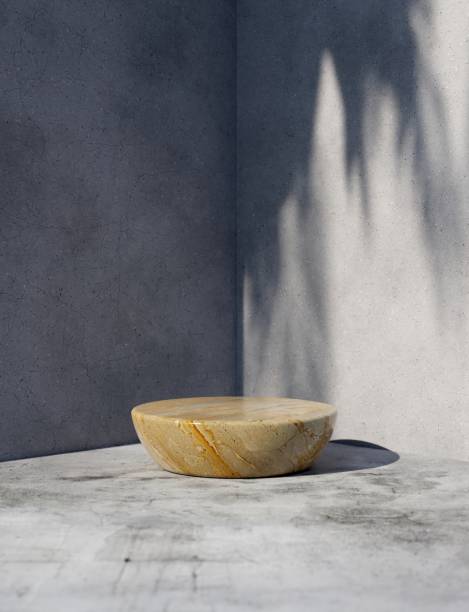 istock Marble podium in a grey concrete corner with palm shadow 1388403701